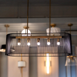 Люстра подвесная овальной формы с металлическим решетчатым абажуром матово-черного цвета и 5 лампами Kichler варинант исполнения - 7 | Loft Concept в Грозном